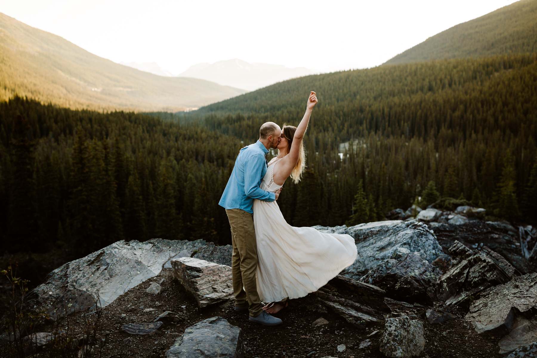 Adventure elopement photographers at Moraine Lake for an anniversary photography session