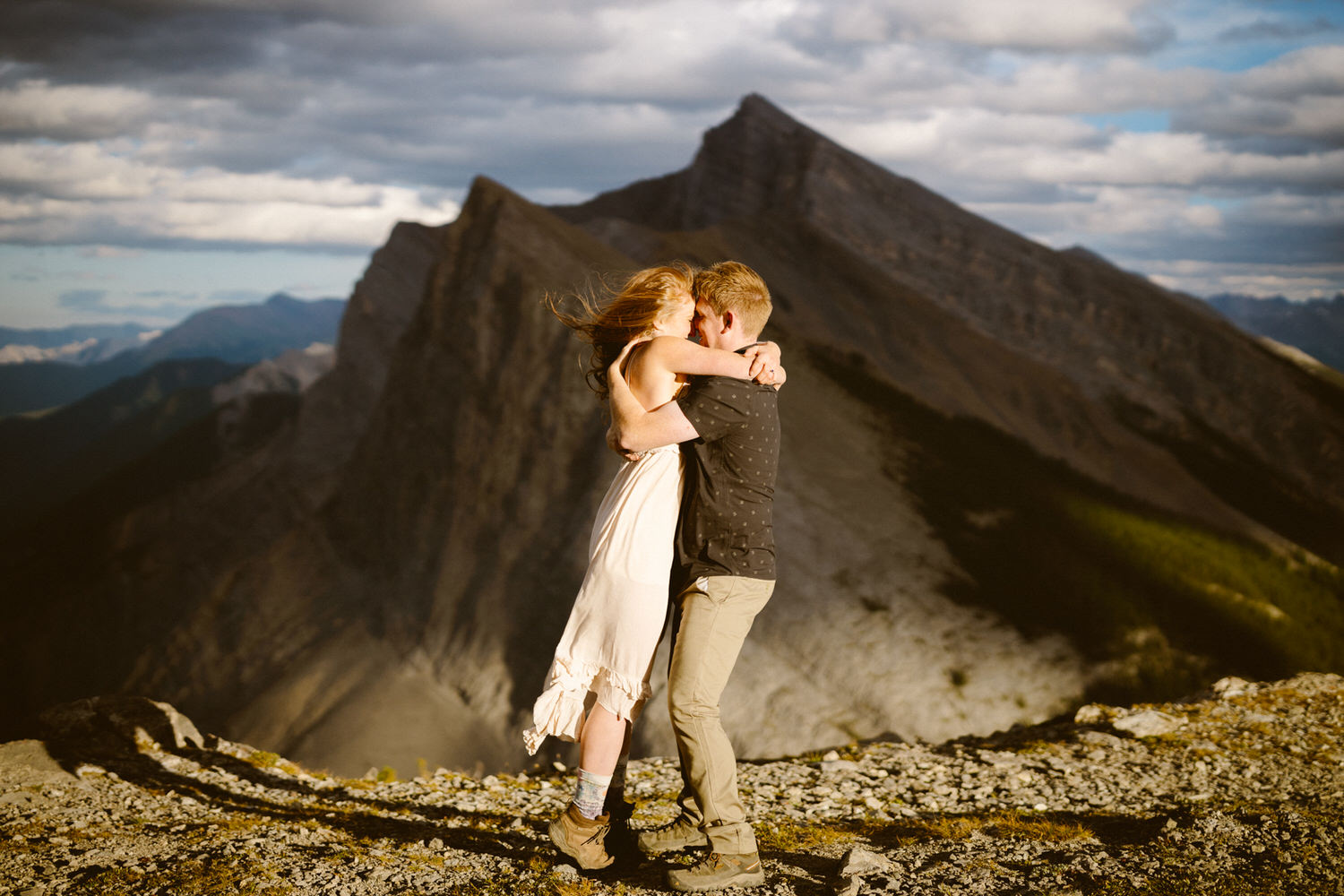 Alberta elopement hiking up a mountain