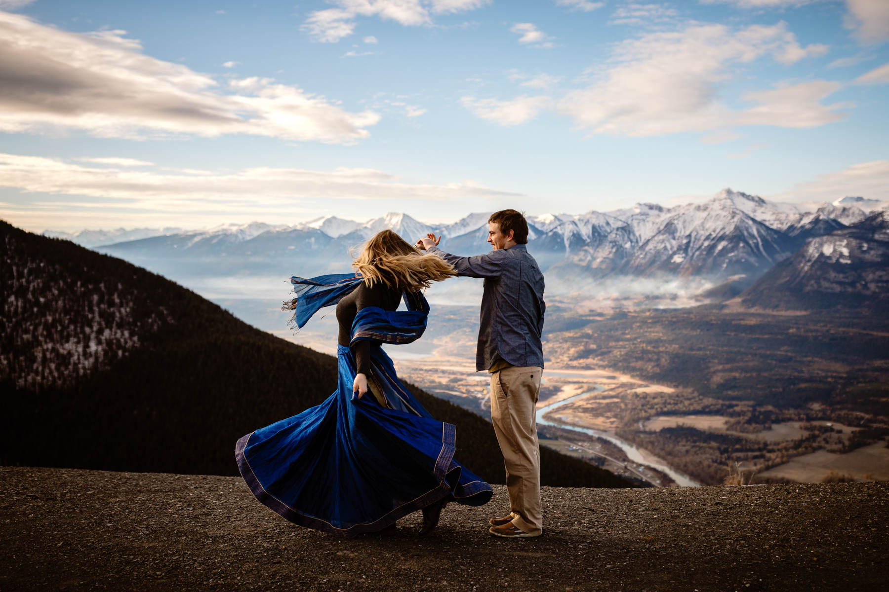 Golden Wedding Photographers in BC (British Columbia) for adventurous engagement photos on a mountain