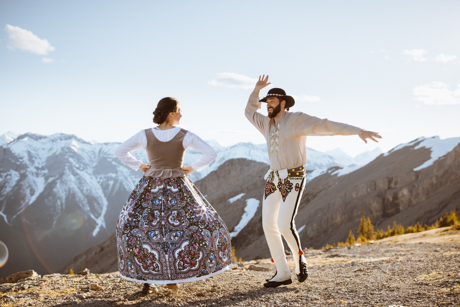 Banff anniversary photographer session in traditional Polish folk dance outfits from the Podhale region