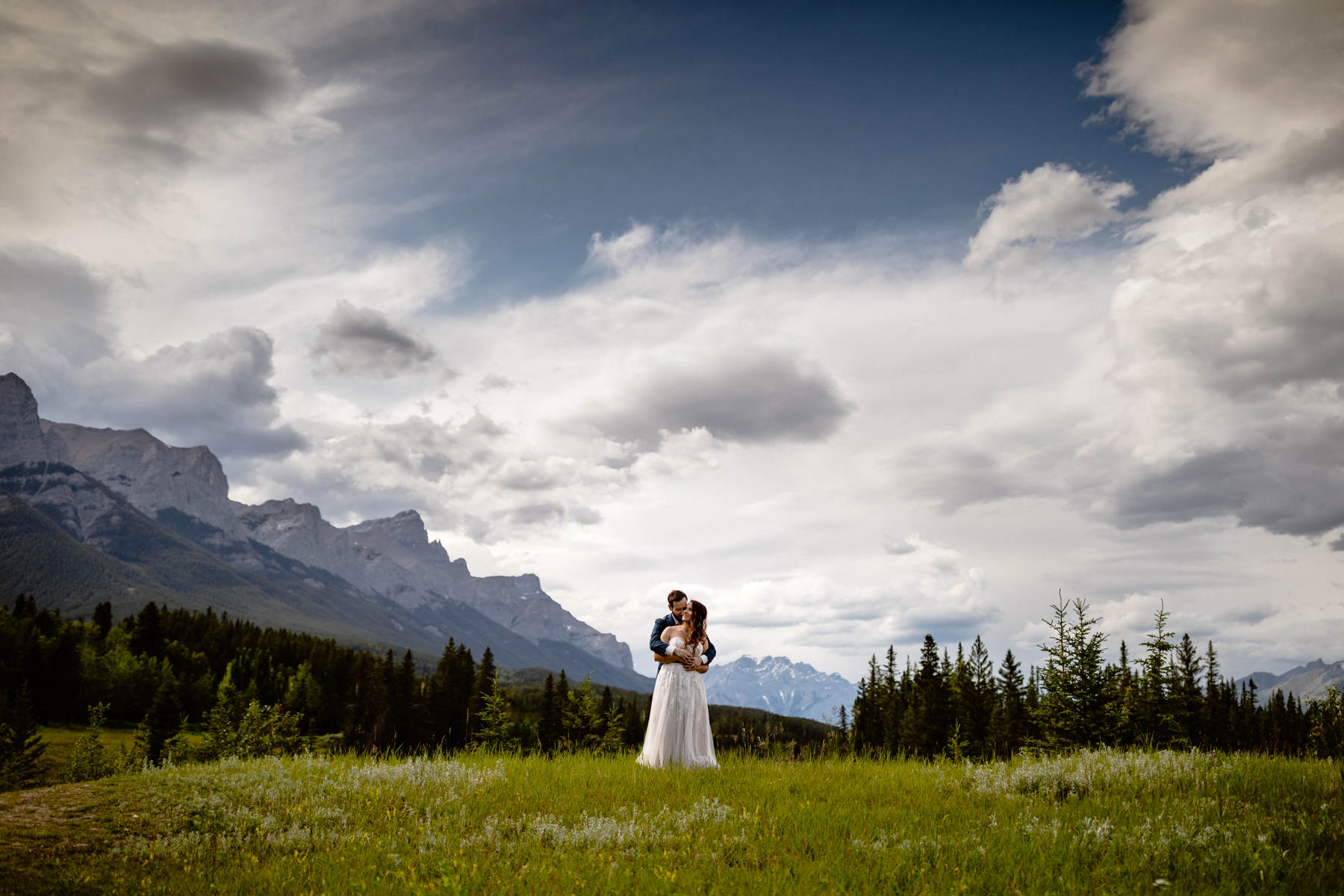 Canmore photographers at a Murrieta's wedding near Spring Creek at sunset