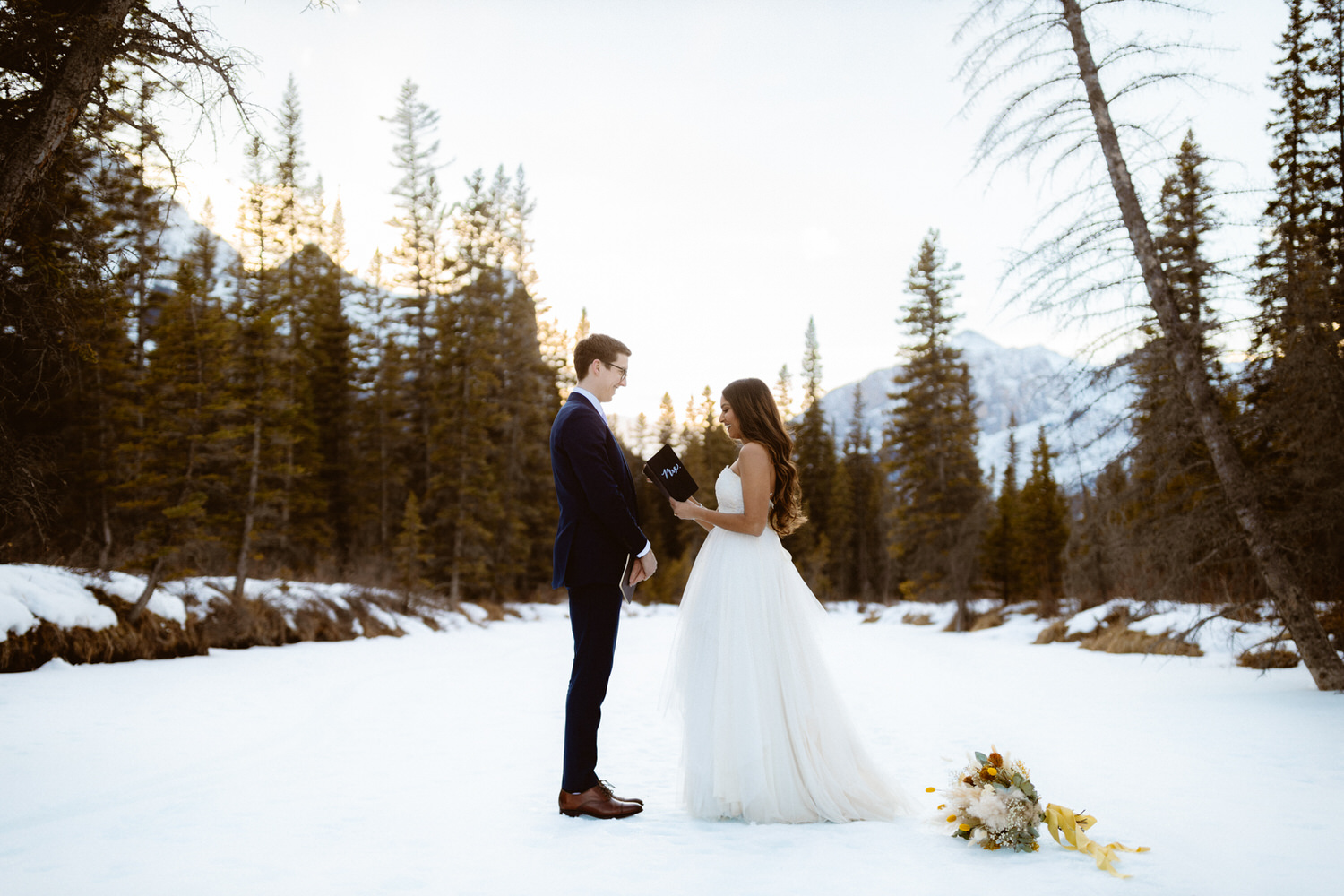 Canmore wedding videographer at a winter elopement ceremony