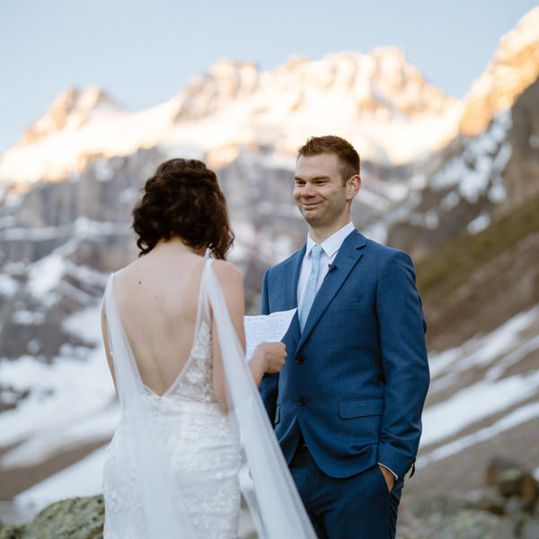 Elopement videographer with bride and groom at Moraine Lake
