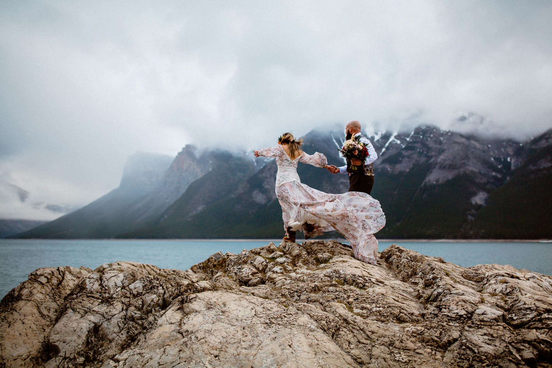 Stormy and Rainy Banff Wedding Photography in May at Lake Minnewanka